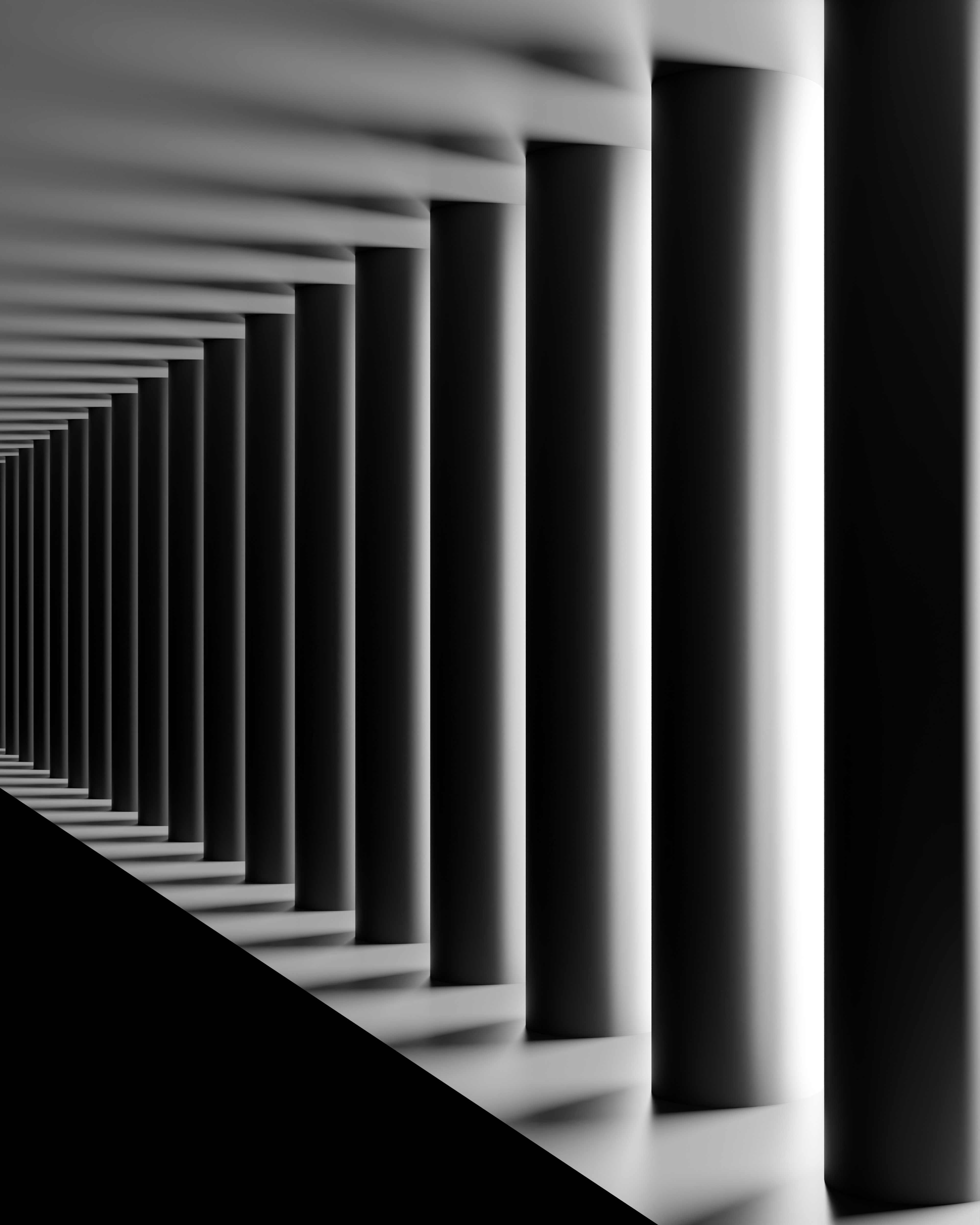 Black-and-white origami folds with soft shadows forming a calm, rhythmic pattern.